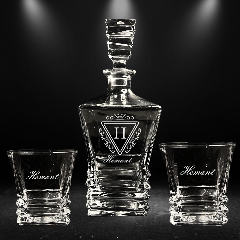 Custom Engraving Options: Personalize the decanter and glasses with names, logos, photos, or monograms using deep engraving techniques to ensure a lasting impression. Elegant Design: The stunning decanter features a classic design, complemented by six intricately crafted glasses, making this set a centerpiece for any home bar or dining table. High-Quality Craftsmanship: Made from premium glass, this set is designed for both style and durability, ensuring it withstands the test of time.