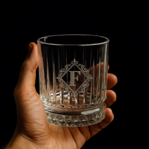 Crystal whiskey glass with premium deep engraving featuring ornate monogram initial, customizable with name, logo, photo, or design – elegant 310ml tumbler gift for all occasions