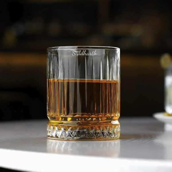 Personalized Crystal Whiskey Glass with Custom Name Engraving – Diamond Cut Base Elevate your whiskey-drinking experience with our Personalized Crystal Whiskey Glass featuring deep name engraving and a stunning diamond-cut base. Designed for sophistication and durability, this glass is perfect for savoring your favorite whiskey, bourbon, or scotch in style.