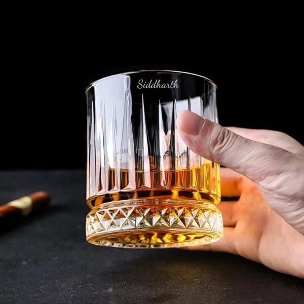 Personalized Crystal Whiskey Glass with Custom Name Engraving – Diamond Cut Base Elevate your whiskey-drinking experience with our Personalized Crystal Whiskey Glass featuring deep name engraving and a stunning diamond-cut base. Designed for sophistication and durability, this glass is perfect for savoring your favorite whiskey, bourbon, or scotch in style.