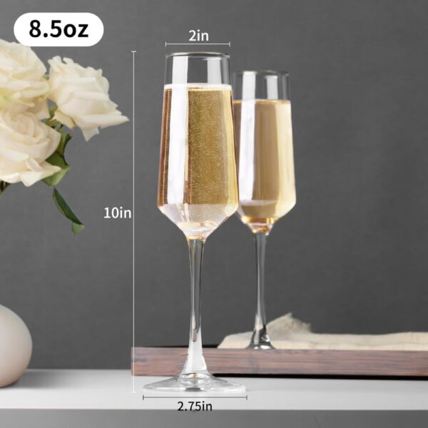Elevate your special celebrations with these exquisite personalized champagne flutes. Each glass features a contemporary geometric design with an elegant, elongated stem that adds sophistication to any occasion. The crystal-clear glassware is enhanced with deep, precision-engraved customisation that maintains its beauty through countless toasts. These premium flutes come as a matching set of two, perfect for wedding ceremonies, anniversaries, or any momentous occasion. The modern angular bowl design helps preserve the bubbles while concentrating the champagne's aroma. The sturdy base ensures stability, whilst the tall, graceful stem allows for proper holding without warming the champagne. These bespoke glasses make for a treasured keepsake that couples can use to celebrate their special moments for years to come. Each flute is carefully crafted to hold the perfect amount of champagne, making them ideal for those celebratory toasts. The sophisticated design complements any table setting, from casual gatherings to formal events.