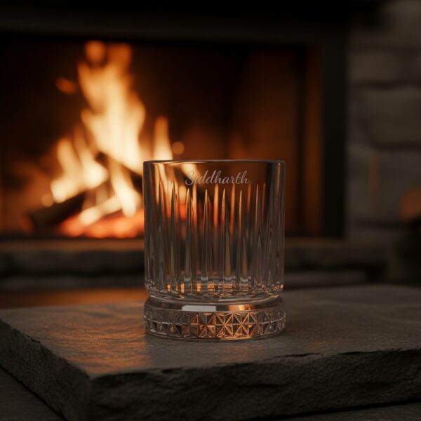 Best2U Personalized Crystal Whiskey Glass with custom name engraving “Siddharth.” This 330ml glass features a sophisticated vertical line pattern and a diamond-cut base that reflects light elegantly. Crafted from premium crystal, the glass combines clarity and durability, making it ideal for whiskey, scotch, or bourbon. The deep engraving ensures the name remains permanent, while the classic design enhances any home bar setting.