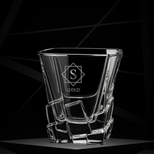 Personalized 310ml crystal whisky glass with twisted base design, engraved with custom monogram and date, displayed on a dark surface