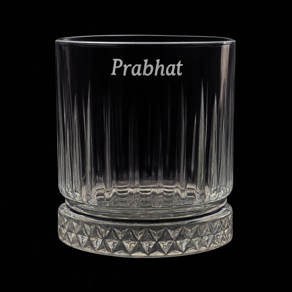 Personalized engraved whiskey glass with name 'Prabhat' on the side and bottom message 'I Promise to Always Be by Your Side', displayed outdoors on grass