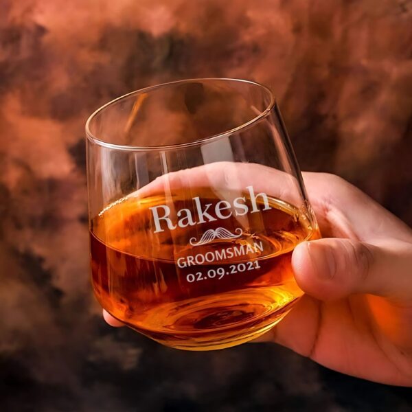 "Personalized engraved whiskey glass with name, groomsman title, and date – custom gift for wedding party or special occasion"