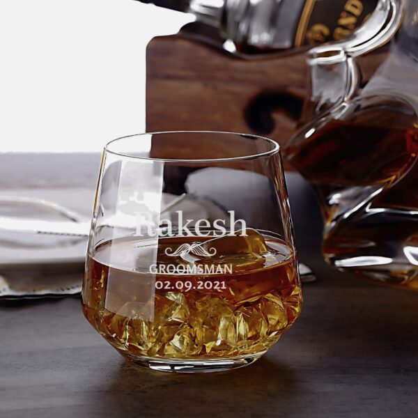 "Personalized engraved whiskey glass with name, groomsman title, and date – custom gift for wedding party or special occasion"