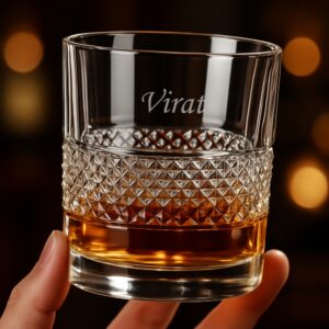 Personalized engraved whiskey glass with geometric diamond-cut design and name engraving