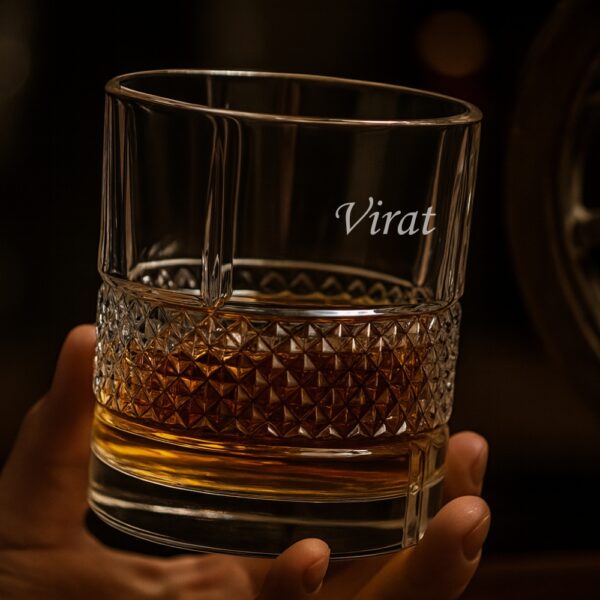 Personalized engraved whiskey glass with geometric diamond-cut design and name engraving