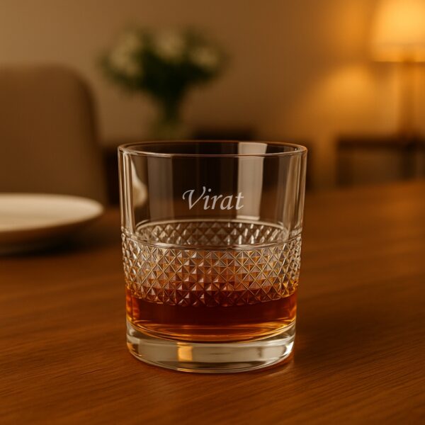 Personalized engraved whiskey glass with geometric diamond-cut design and name engraving
