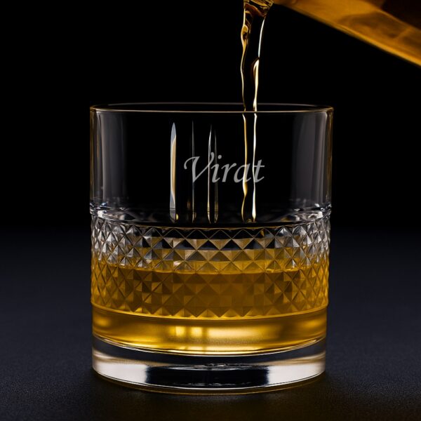 Personalized engraved whiskey glass with geometric diamond-cut design and name engraving
